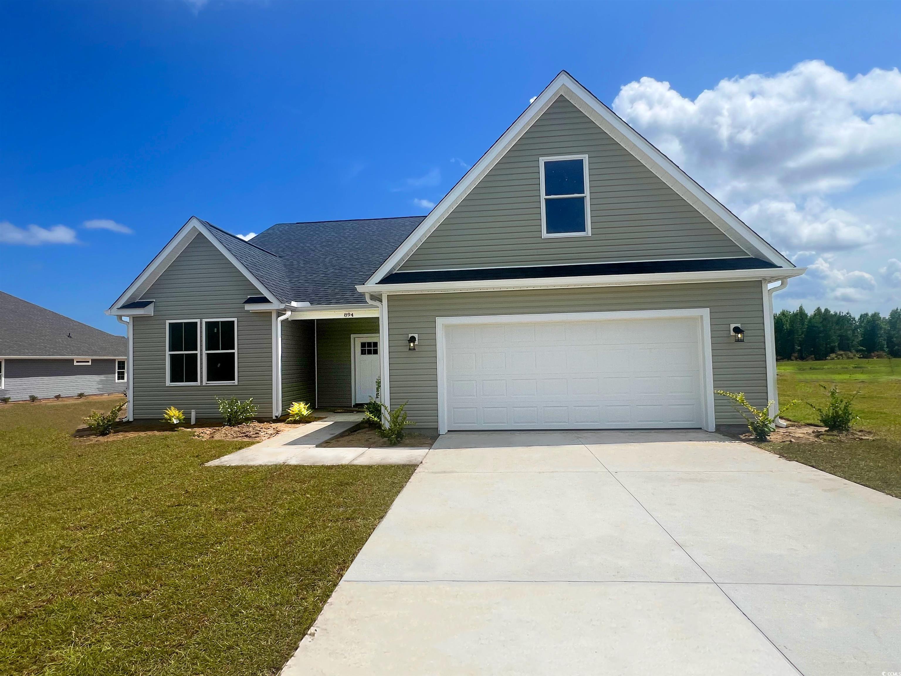 894 Liberty Church Road Loris, SC 29569 - Photo 1 of 5 Traditional home featuring driveway and a front la