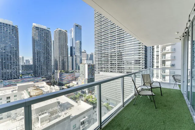 a room with furniture and a chandelier