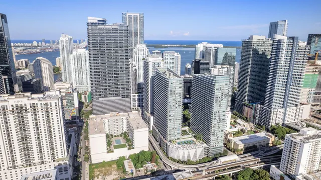 a view of a swimming pool with a lounge chairs