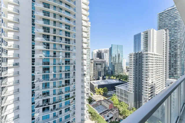 a outdoor dining space with furniture and a potted plant
