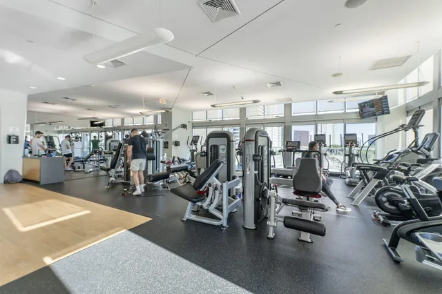 a tall building sitting next to a tall building