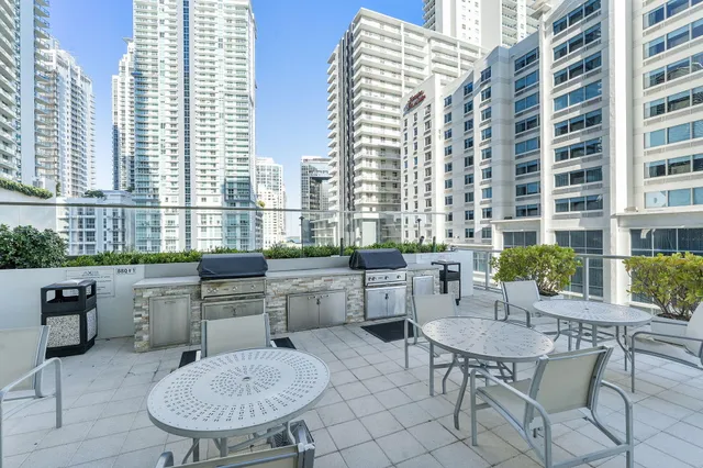 a view of a city with tall buildings