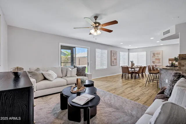 a view of a dining room with furniture and window