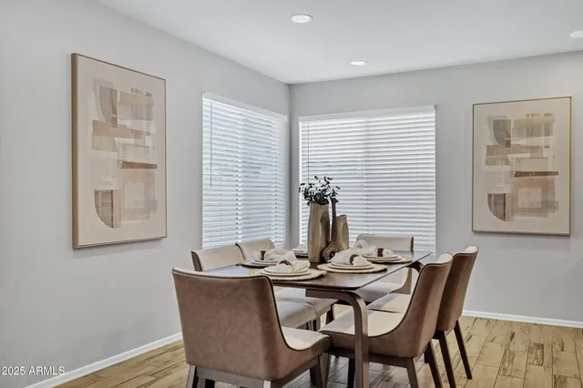 a view of a dining room with furniture