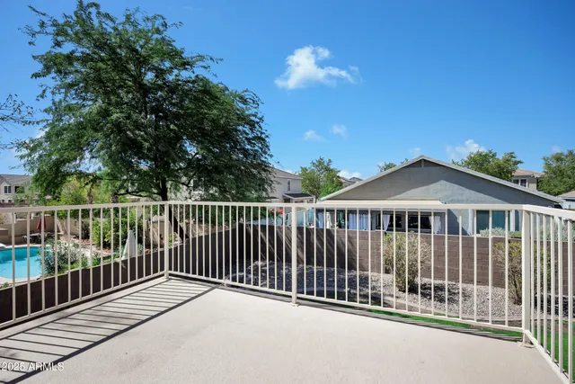 a view of a house with a roof deck