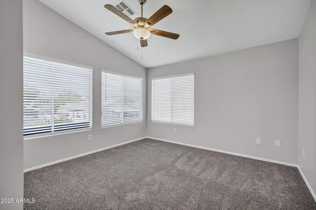 a view of livingroom with hardwood floor and a ceiling fan