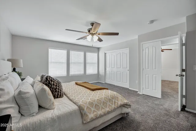 a kitchen with granite countertop kitchen island stainless steel appliances a sink stove and refrigerator