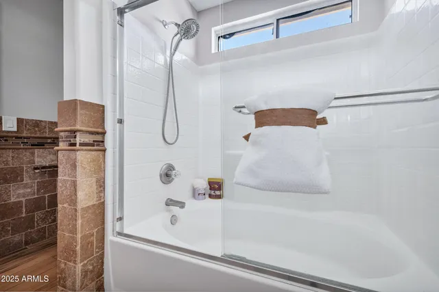 a kitchen with sink stove and cabinets