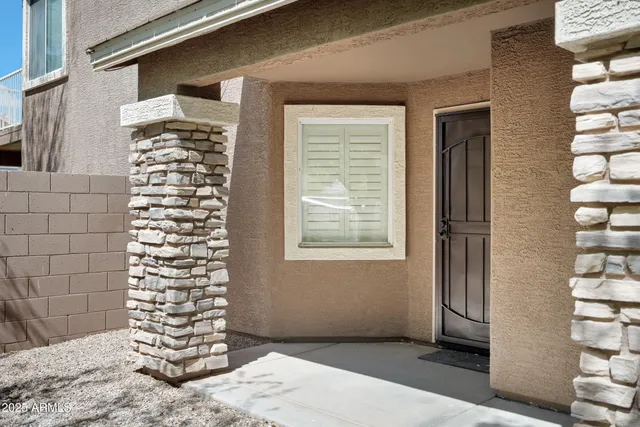 a view of entryway with a front door
