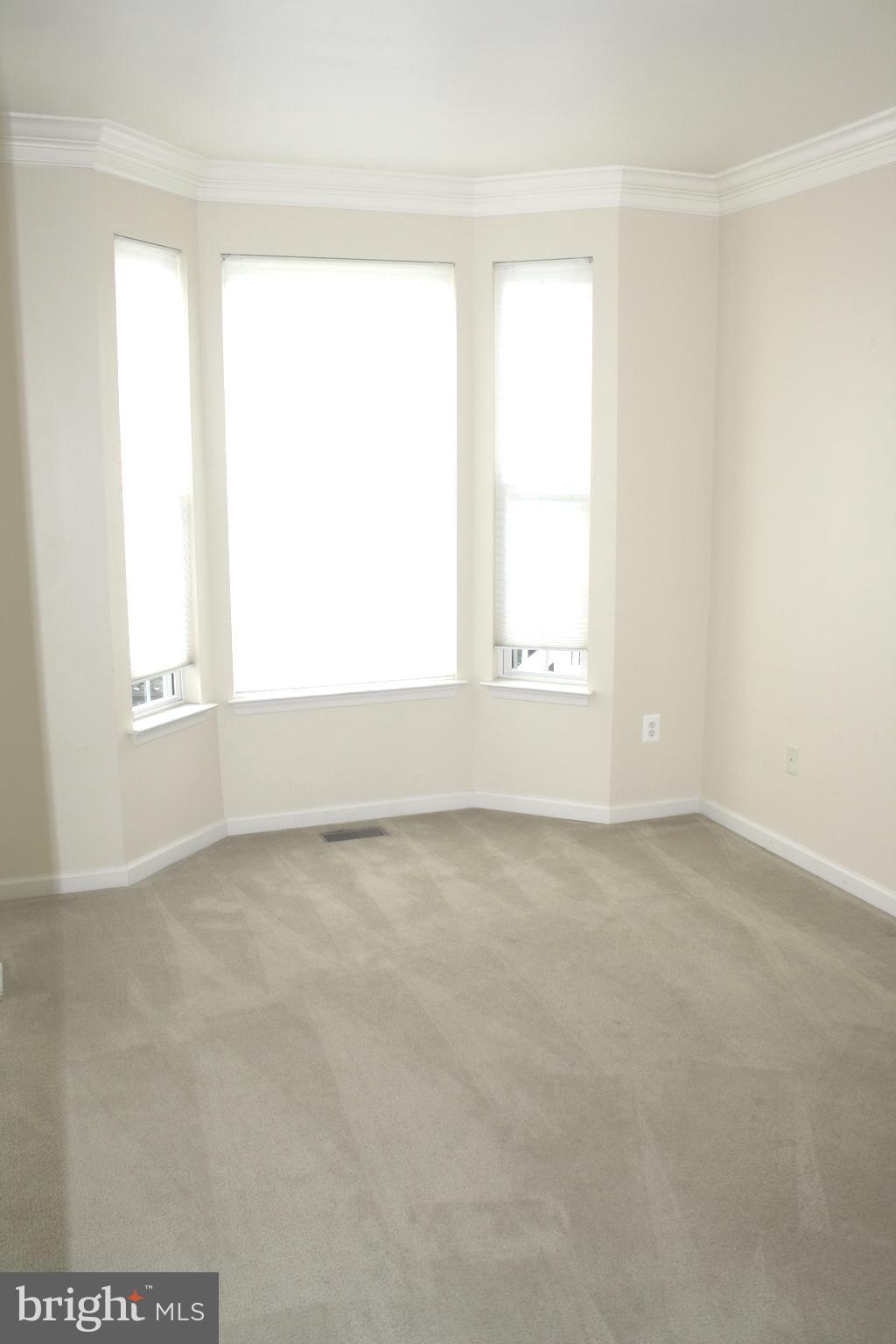 8378 Tillett Loop Manassas, VA 20110 - Photo 12 of 24 an empty room with a window