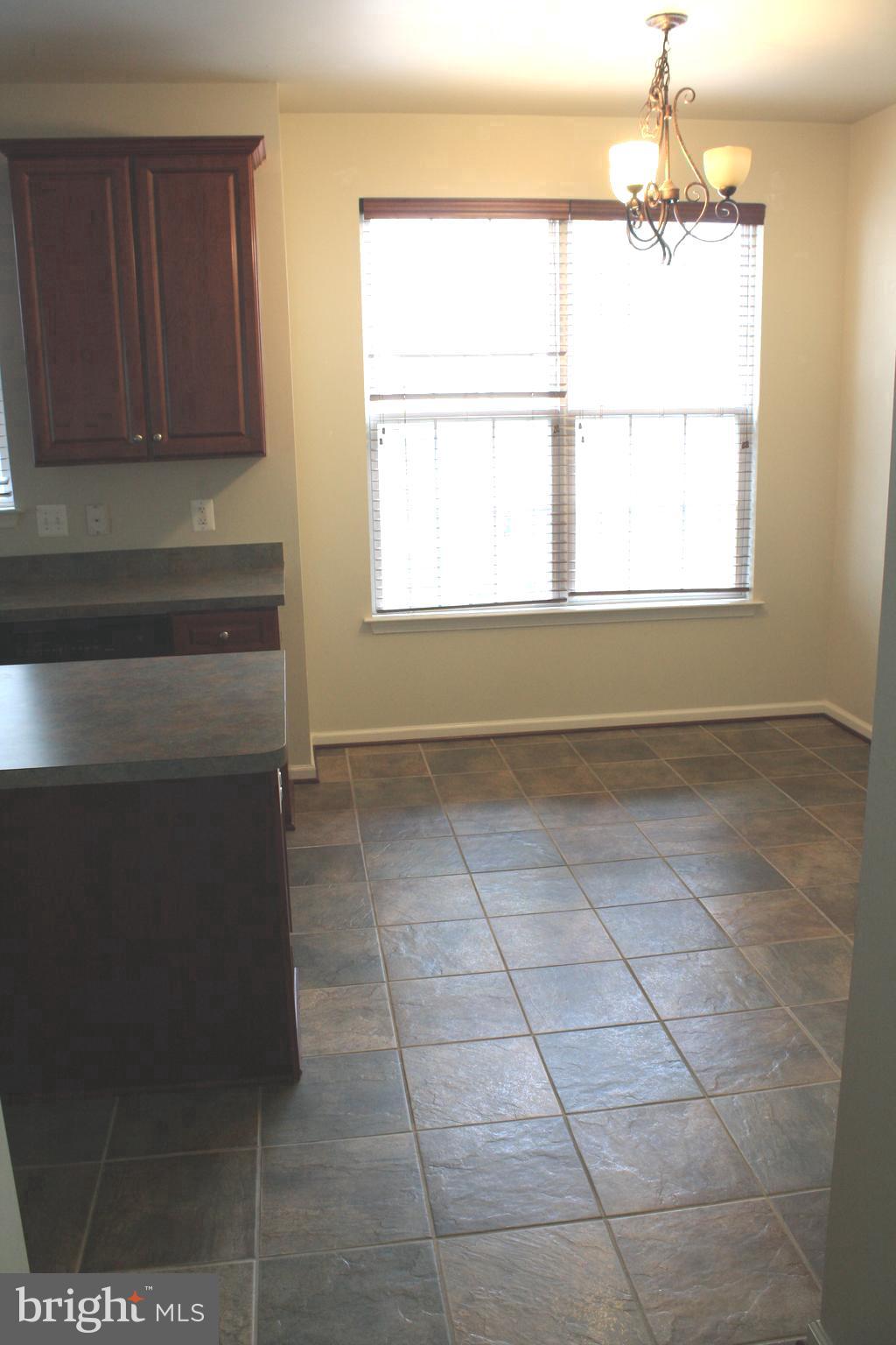 8378 Tillett Loop Manassas, VA 20110 - Photo 5 of 24 a view of an empty room with a window