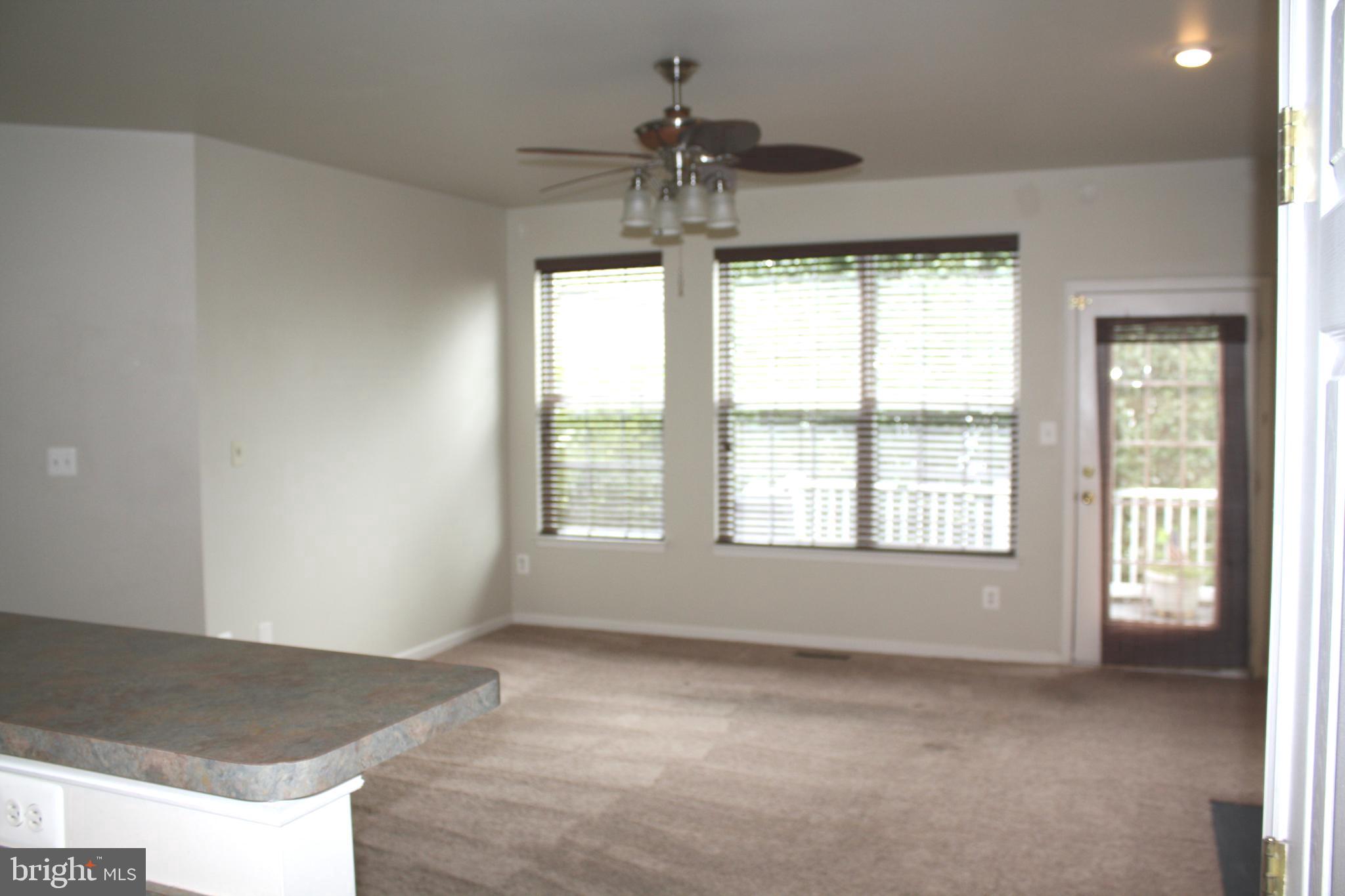 8378 Tillett Loop Manassas, VA 20110 - Photo 7 of 24 a view of an empty room and window