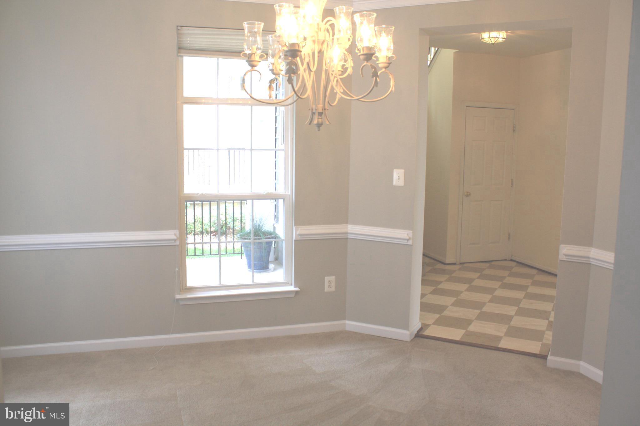 8378 Tillett Loop Manassas, VA 20110 - Photo 9 of 24 a view of an empty room with a window