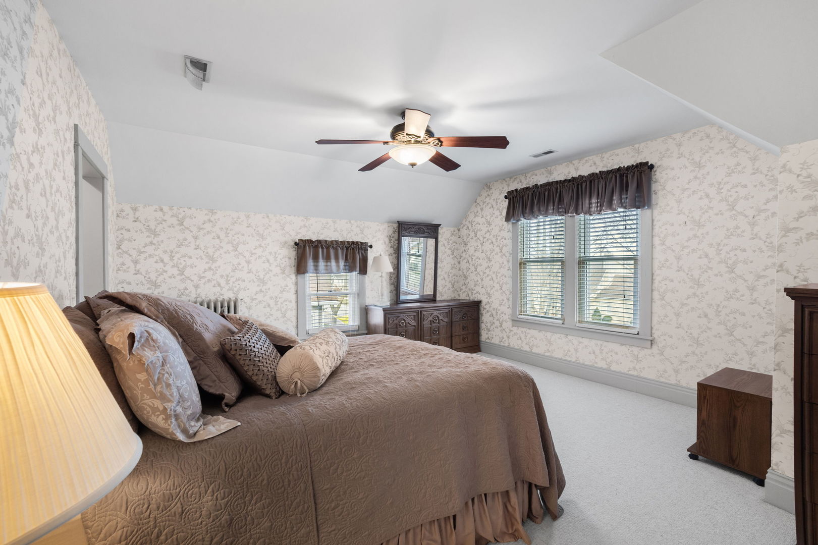 618 Woodward Street Beecher, IL 60401 - Photo 13 of 23 a spacious bedroom with a bed and a chandelier