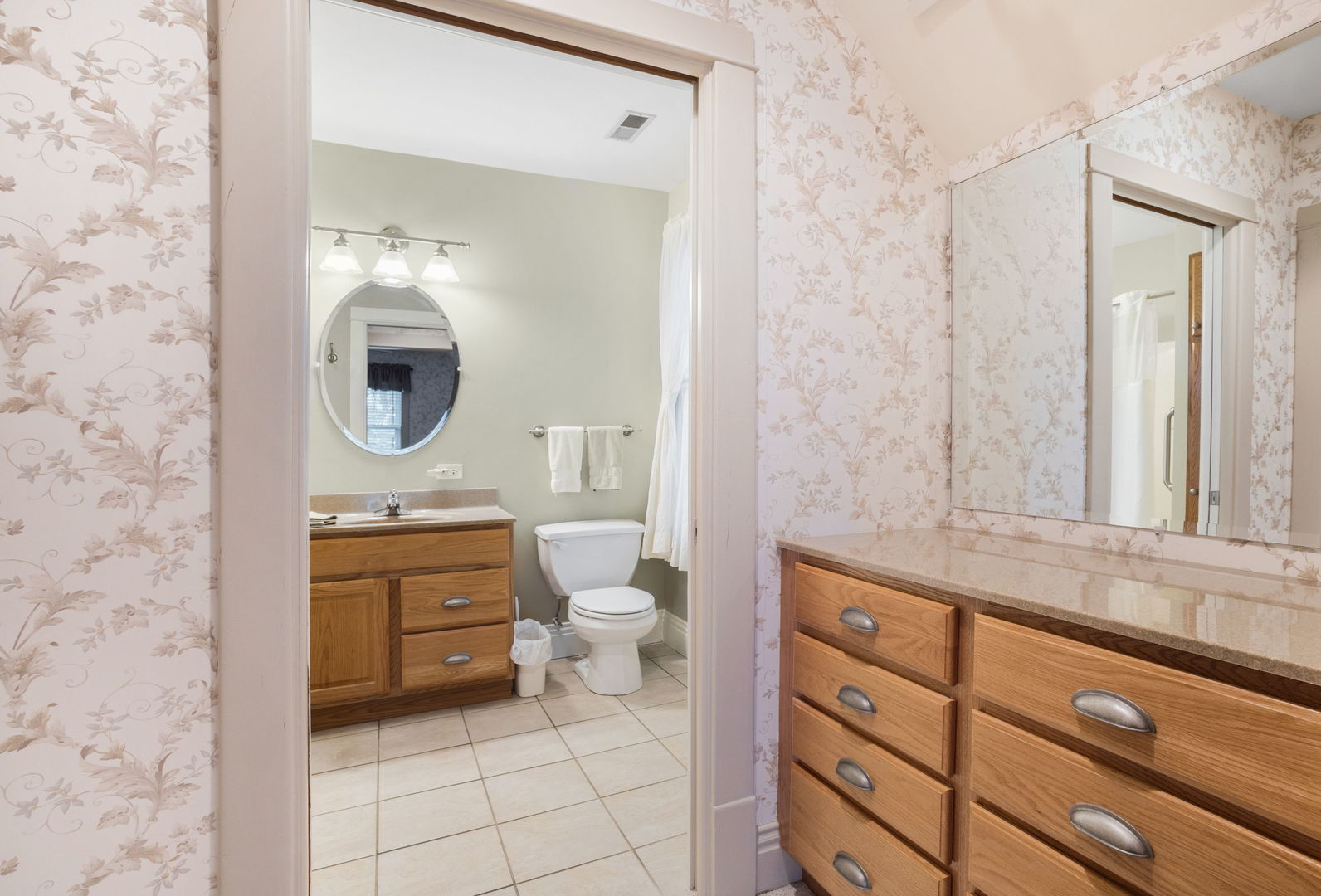 618 Woodward Street Beecher, IL 60401 - Photo 15 of 23 a spacious bathroom with a toilet sink and mirror