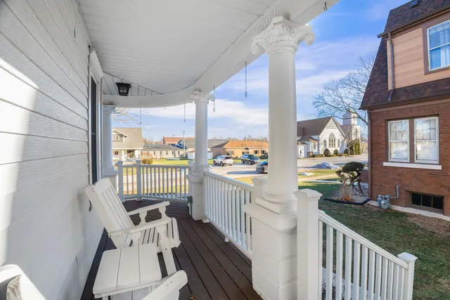 a view of a balcony with chair