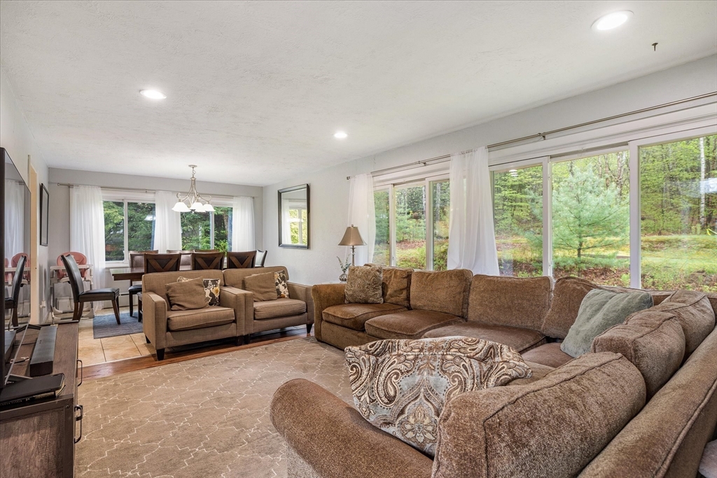 240 Worcester Road Barre, MA 01005 - Photo 11 of 38 a living room with furniture and a large window