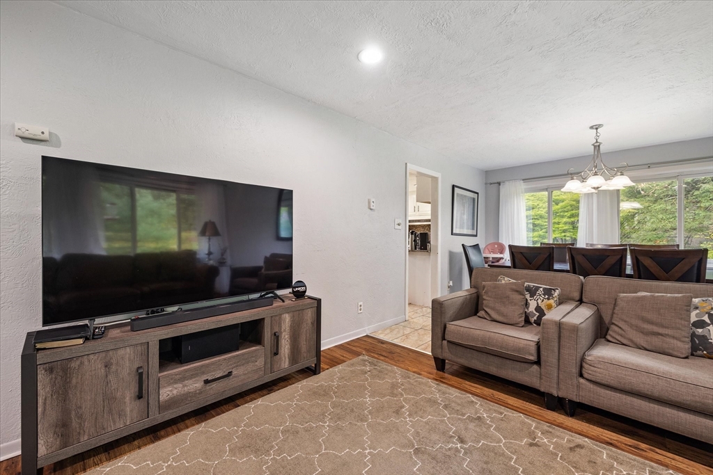 240 Worcester Road Barre, MA 01005 - Photo 12 of 38 a living room with furniture and a flat screen tv