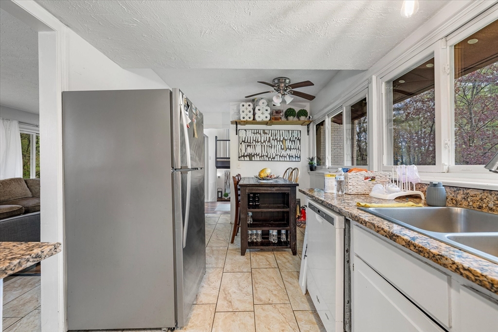 240 Worcester Road Barre, MA 01005 - Photo 16 of 38 a kitchen with a refrigerator and a sink