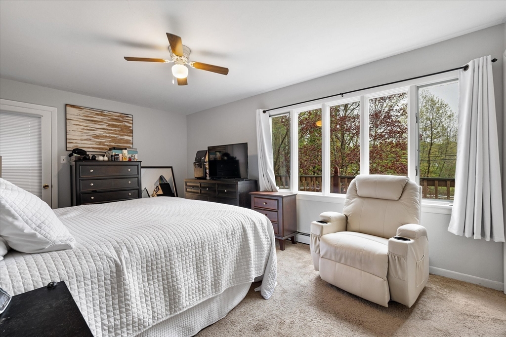 240 Worcester Road Barre, MA 01005 - Photo 22 of 38 a bedroom with a bed and a large window