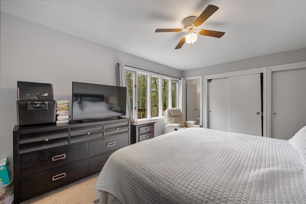 240 Worcester Road Barre, MA 01005 - Photo 24 of 38 a bedroom with a bed and a flat screen tv