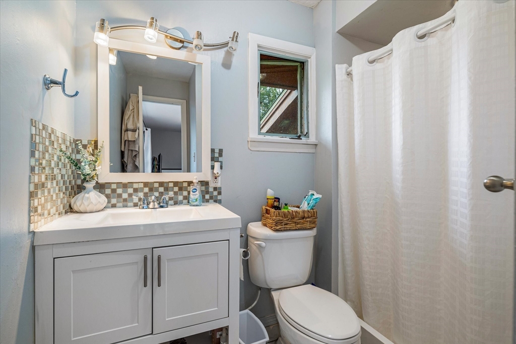 240 Worcester Road Barre, MA 01005 - Photo 25 of 38 a bathroom with a sink toilet and mirror