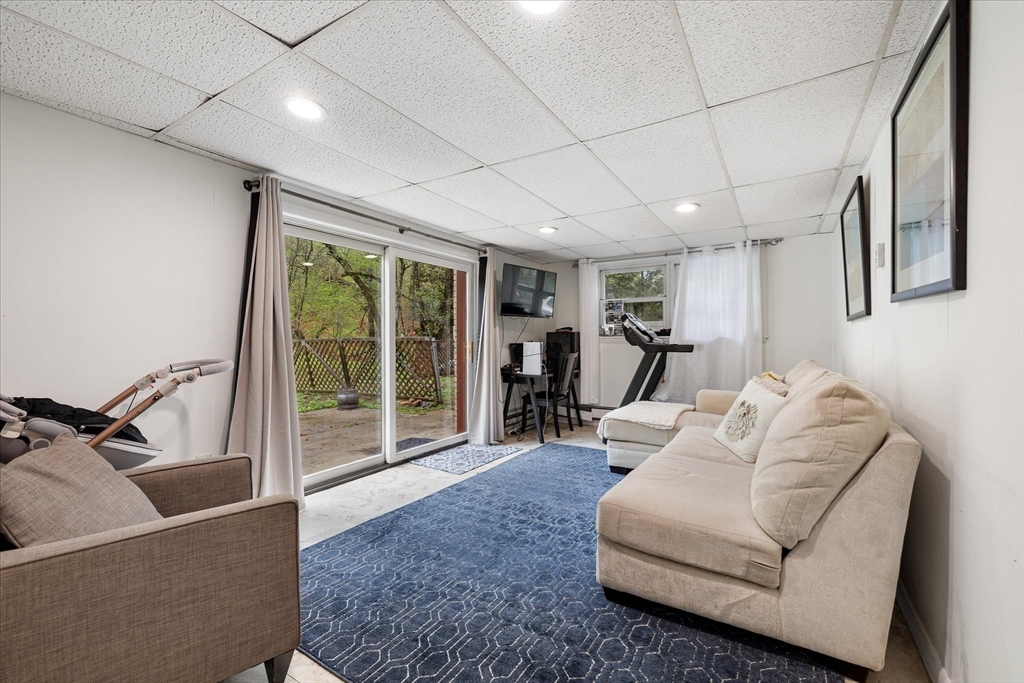 240 Worcester Road Barre, MA 01005 - Photo 34 of 38 a living room with furniture and a flat screen tv
