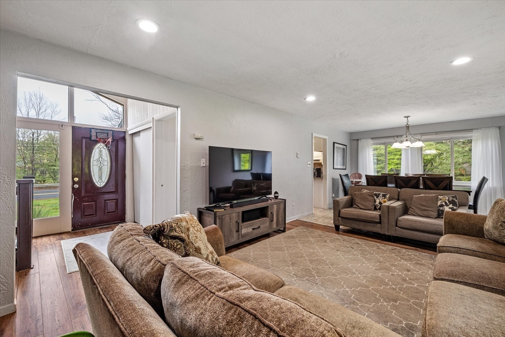 240 Worcester Road Barre, MA 01005 - Photo 10 of 38 a living room with furniture and a flat screen tv