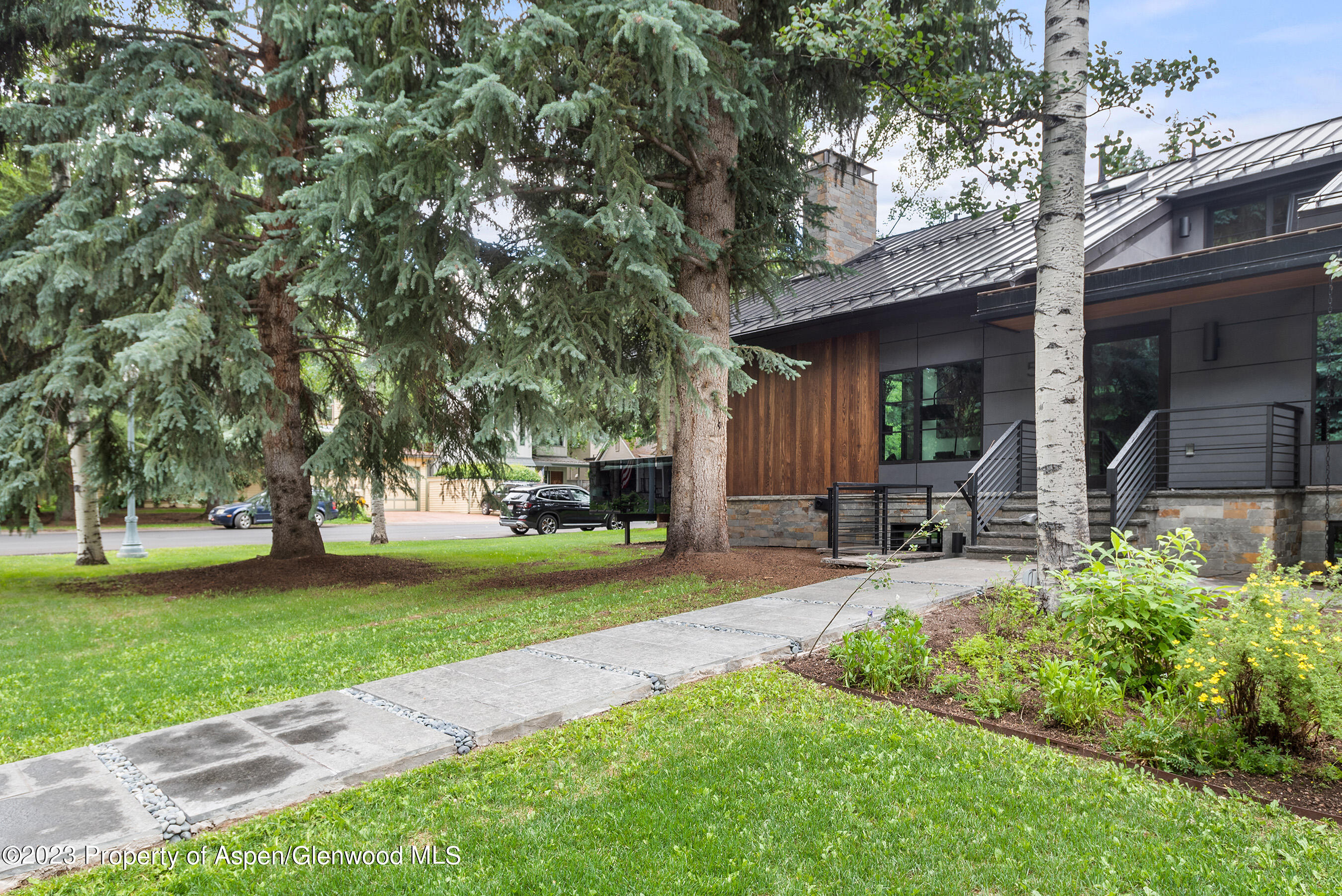 503 North 4th Street Aspen, CO 81611 - Photo 20 of 21 a view of a backyard with sitting area