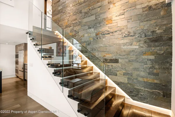 a view of entryway with wooden floor