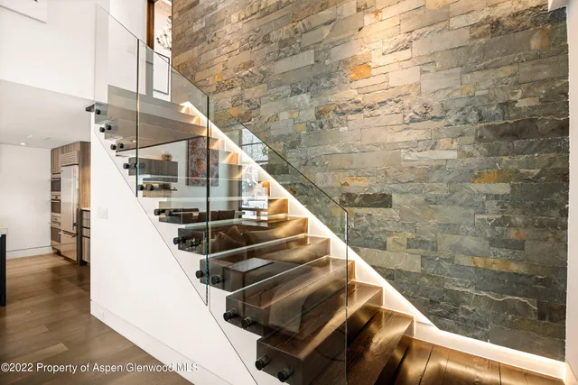 a view of entryway with wooden floor