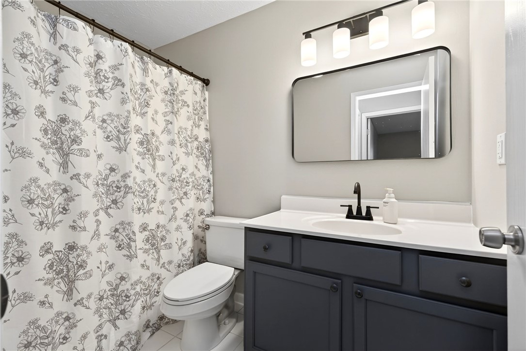3151 Roesch Boulevard, Unit 6 Fairfield, OH 45014 - Photo 15 of 29 This bathroom features a contemporary vanity and stylish fixtures, offering a refreshing space for daily routines.