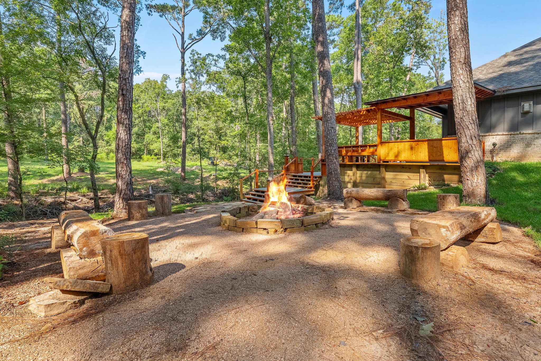 205 Tall Pine Livingston, TX 77351 - Photo 34 of 42 a view of a patio with table and chairs and potted plants