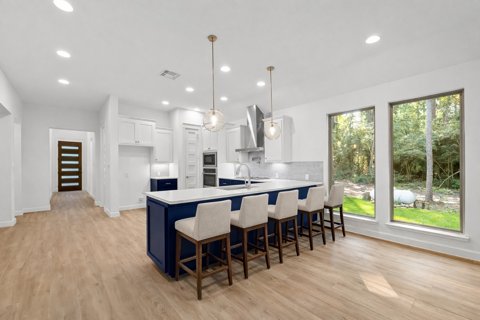 205 Tall Pine Livingston, TX 77351 - Photo 10 of 42 a large kitchen with a table and chairs