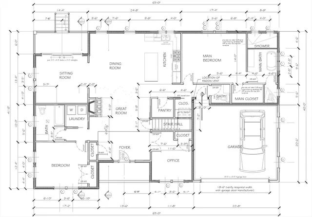 a kitchen with stainless steel appliances white cabinets and wooden floor