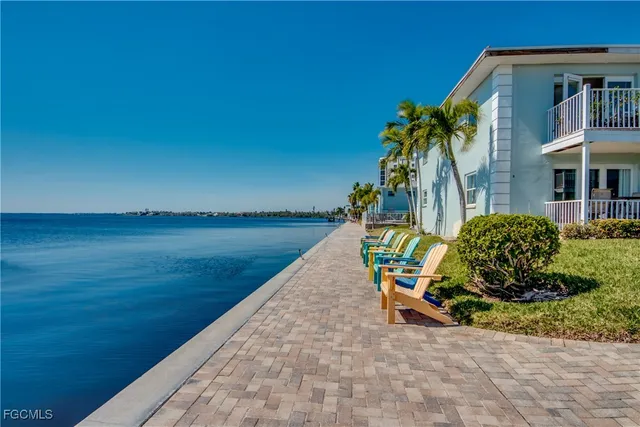 a view of house with outdoor space and seating space