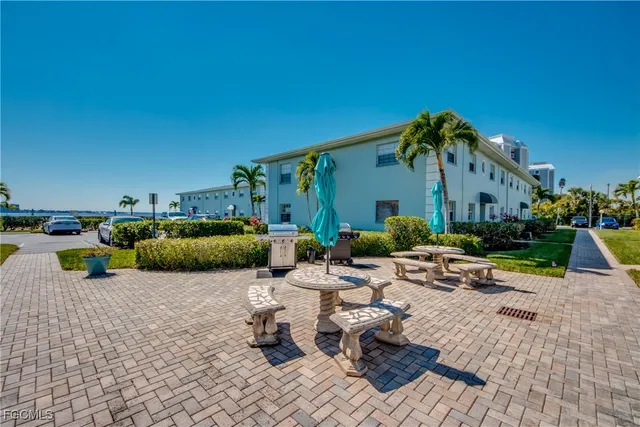 an outdoor space with patio furniture