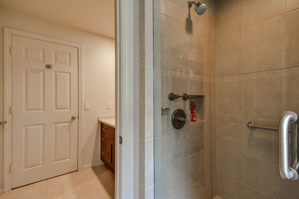 7 Steepletree Lane, Unit 7 Wayland, MA 01778 - Photo 15 of 22 a bathroom with a shower