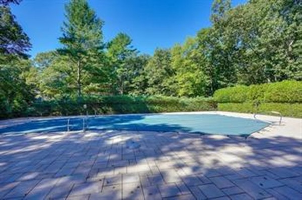 7 Steepletree Lane, Unit 7 Wayland, MA 01778 - Photo 21 of 22 a view of a backyard with large trees