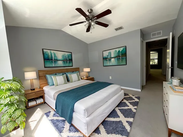 a bathroom with a sink vanity and toilet