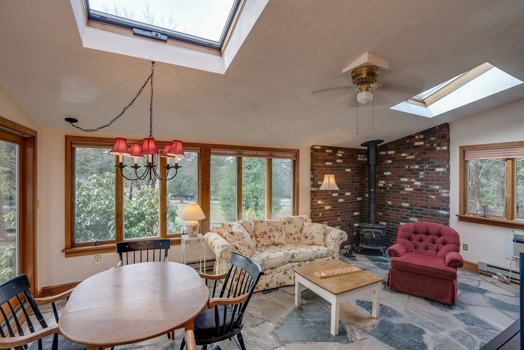 35 Wilson Road Bedford, MA 01730 - Photo 15 of 42 a living room with furniture and a large window