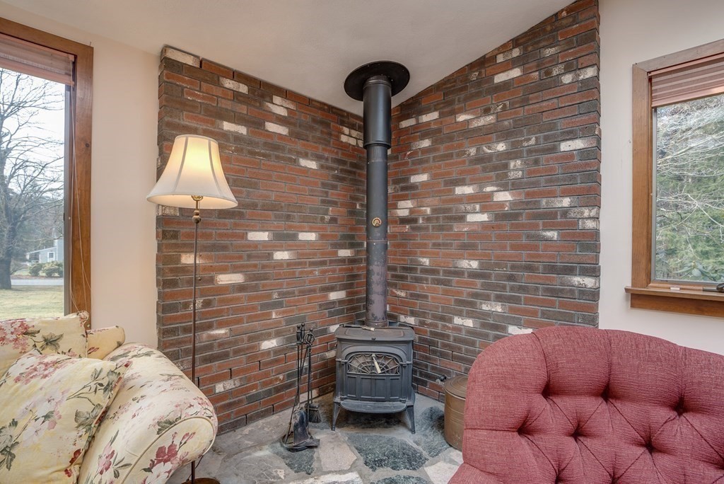 35 Wilson Road Bedford, MA 01730 - Photo 17 of 42 a bedroom with a bed and a window