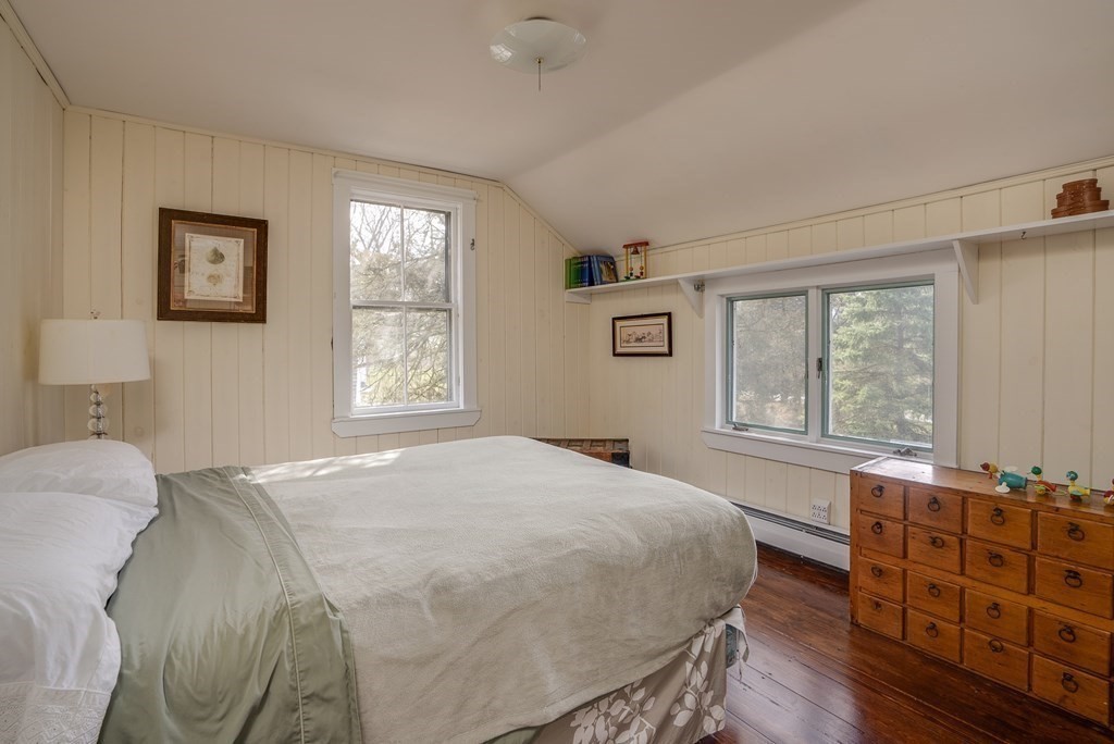 35 Wilson Road Bedford, MA 01730 - Photo 26 of 42 a bedroom with a bed and a window
