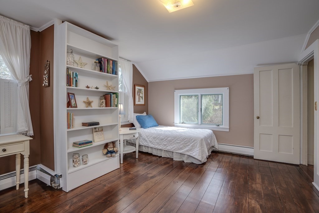 35 Wilson Road Bedford, MA 01730 - Photo 30 of 42 a bedroom with a bed and a window