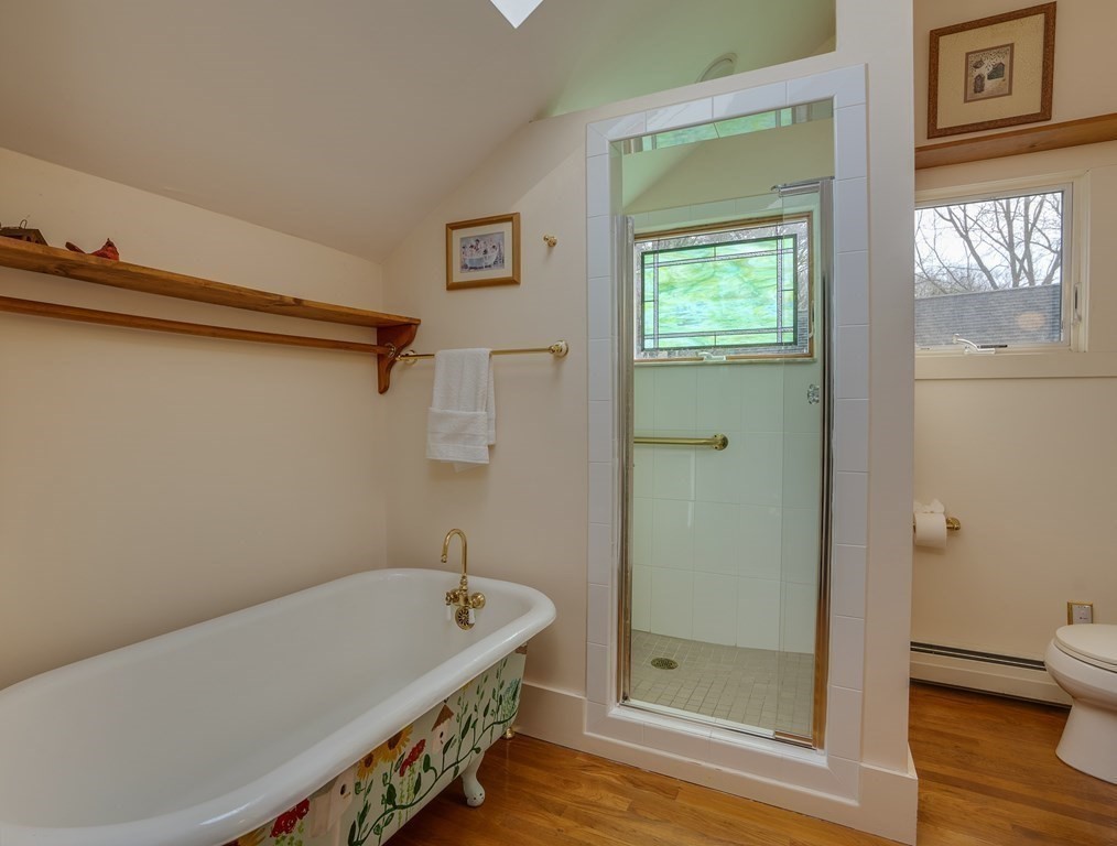 35 Wilson Road Bedford, MA 01730 - Photo 32 of 42 a bathroom with a tub and a shower