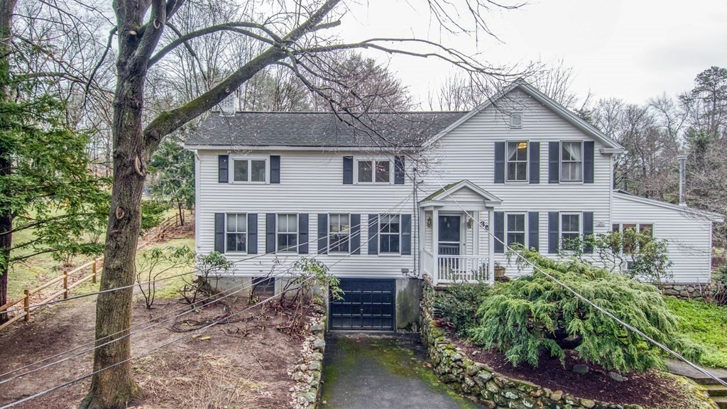 35 Wilson Road Bedford, MA 01730 - Photo 34 of 42 front view of a house with a small yard