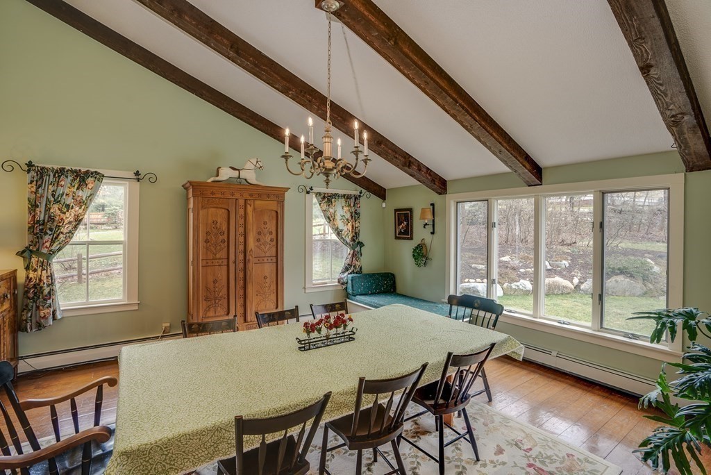 35 Wilson Road Bedford, MA 01730 - Photo 8 of 42 a view of a dining room with furniture window and outside view