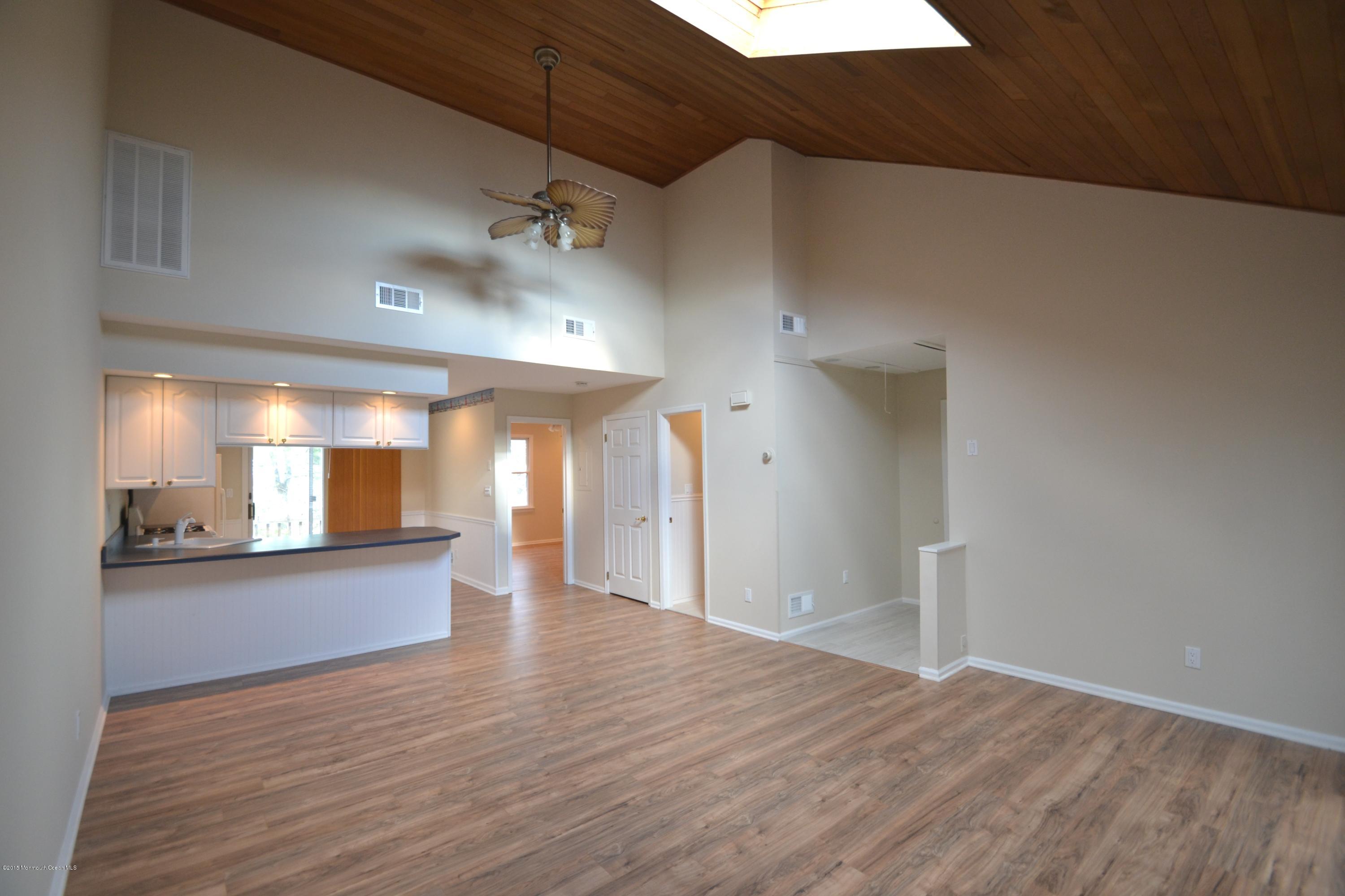 1212 Beaver Dam Road, Unit 14 Point Pleasant, NJ 08742 - Photo 1 of 14 a view of a kitchen and a window