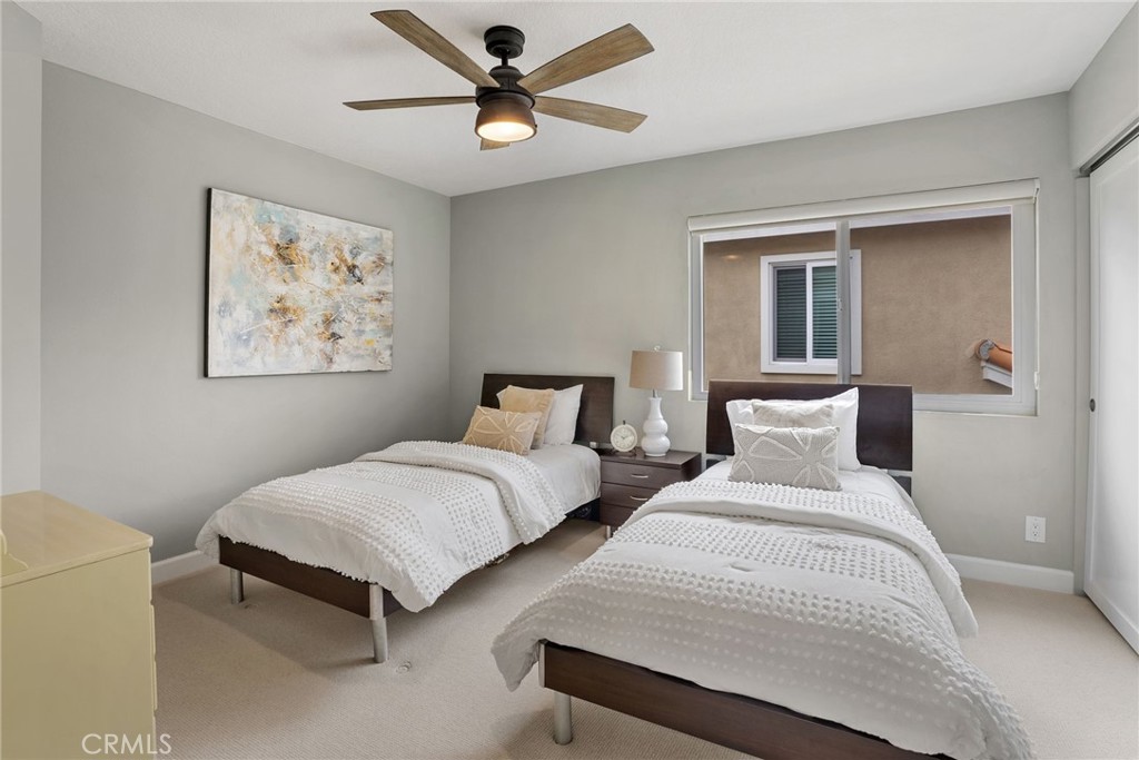 29632 Alta Terra Laguna Niguel, CA 92677 - Photo 27 of 37 a bedroom with two beds and painting on the wall