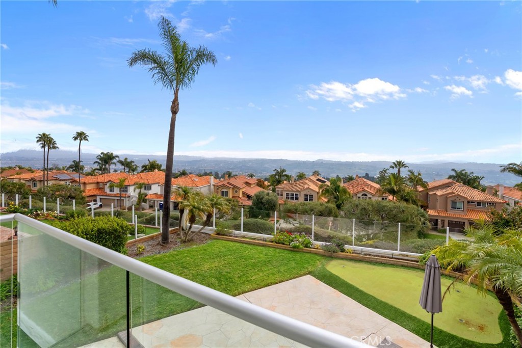 29632 Alta Terra Laguna Niguel, CA 92677 - Photo 31 of 37 a view of a swimming pool with a lawn chairs